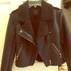 Black leather jacket w gold hardware!